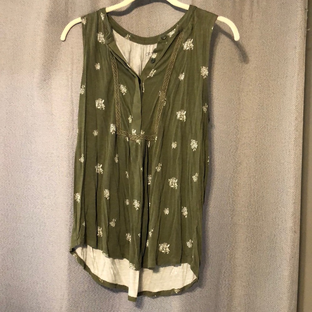 Army green with floral accent. Button down front. Sleeveless blouse. Loft M.